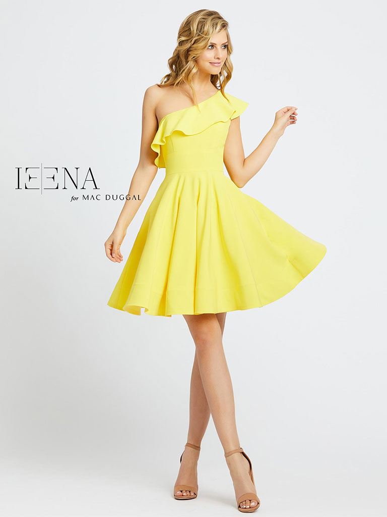 Model in yellow Mac Duggal dresses